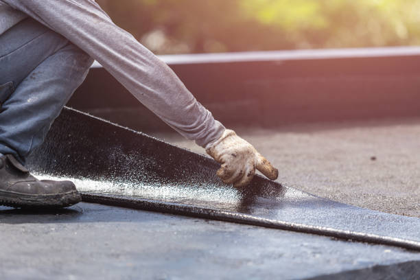 Professional Basement Waterproofing technician working in Kennett Square, PA